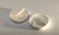 Lamination of pharmaceutical tablets: classification and influence of process parameters