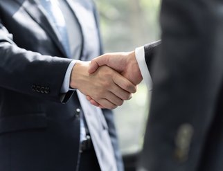business men shake hand